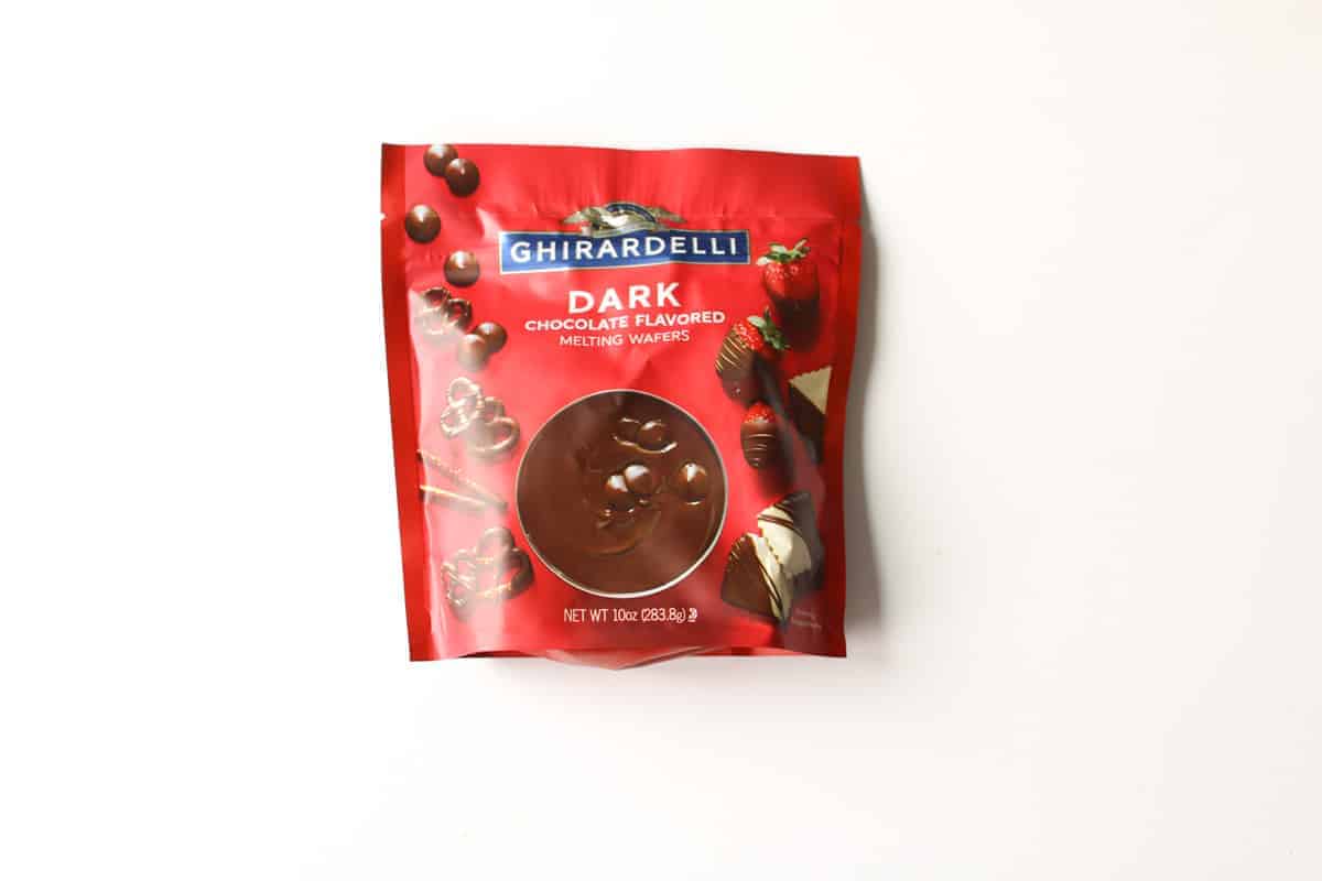 Dark Chocolate Melting Wafers in Bag on a white background